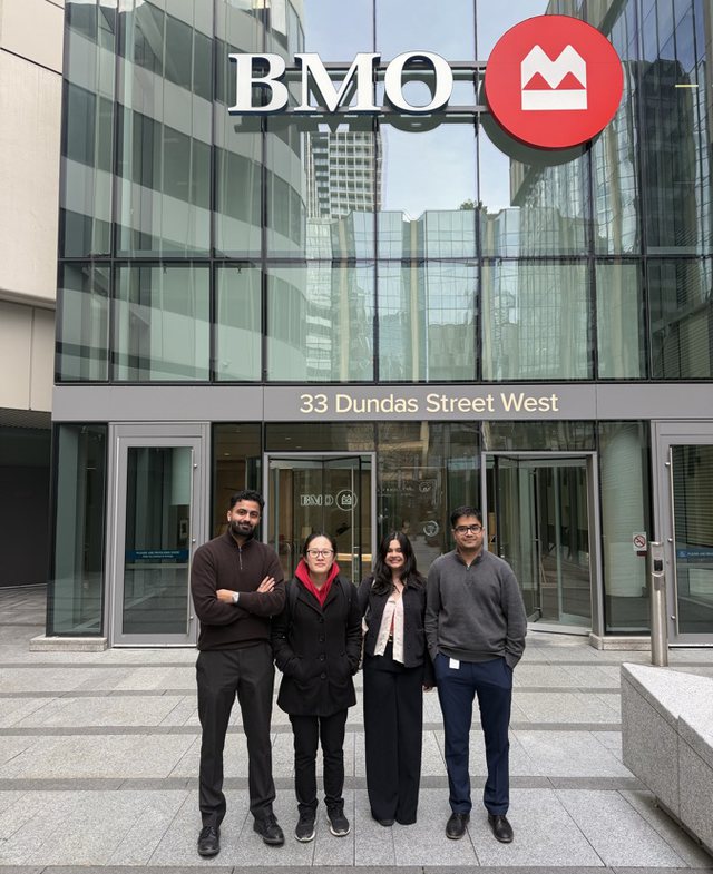 team photo outside bmo, 33 dundas street west